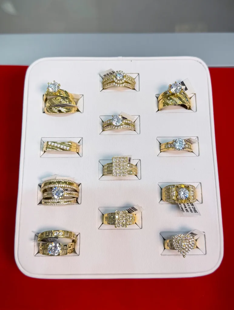 Gold diamond ring collection displayed at a jewelry store in Cape Coral