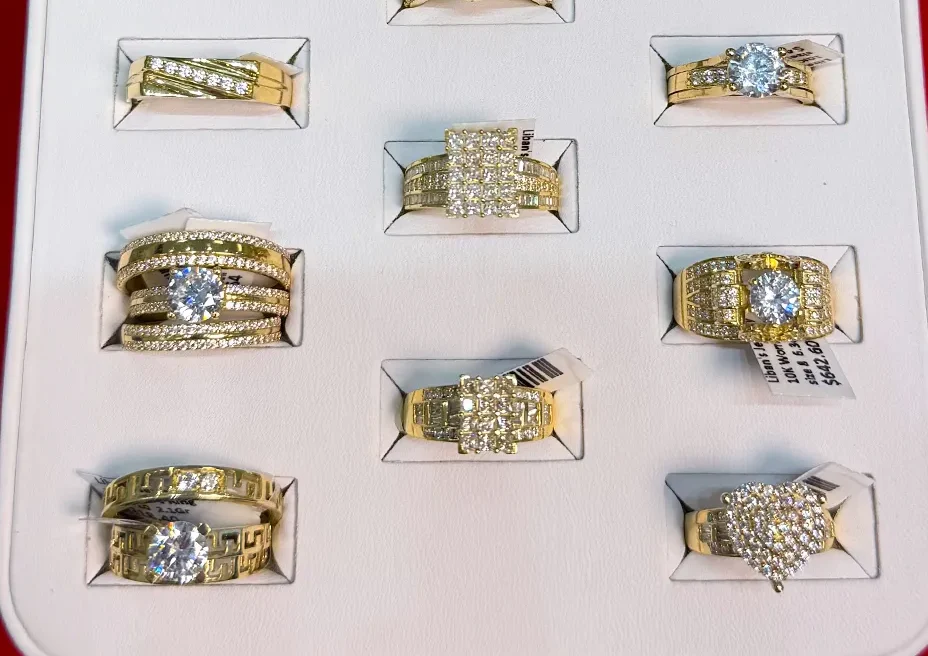 Gold diamond ring collection displayed at a jewelry store in Cape Coral